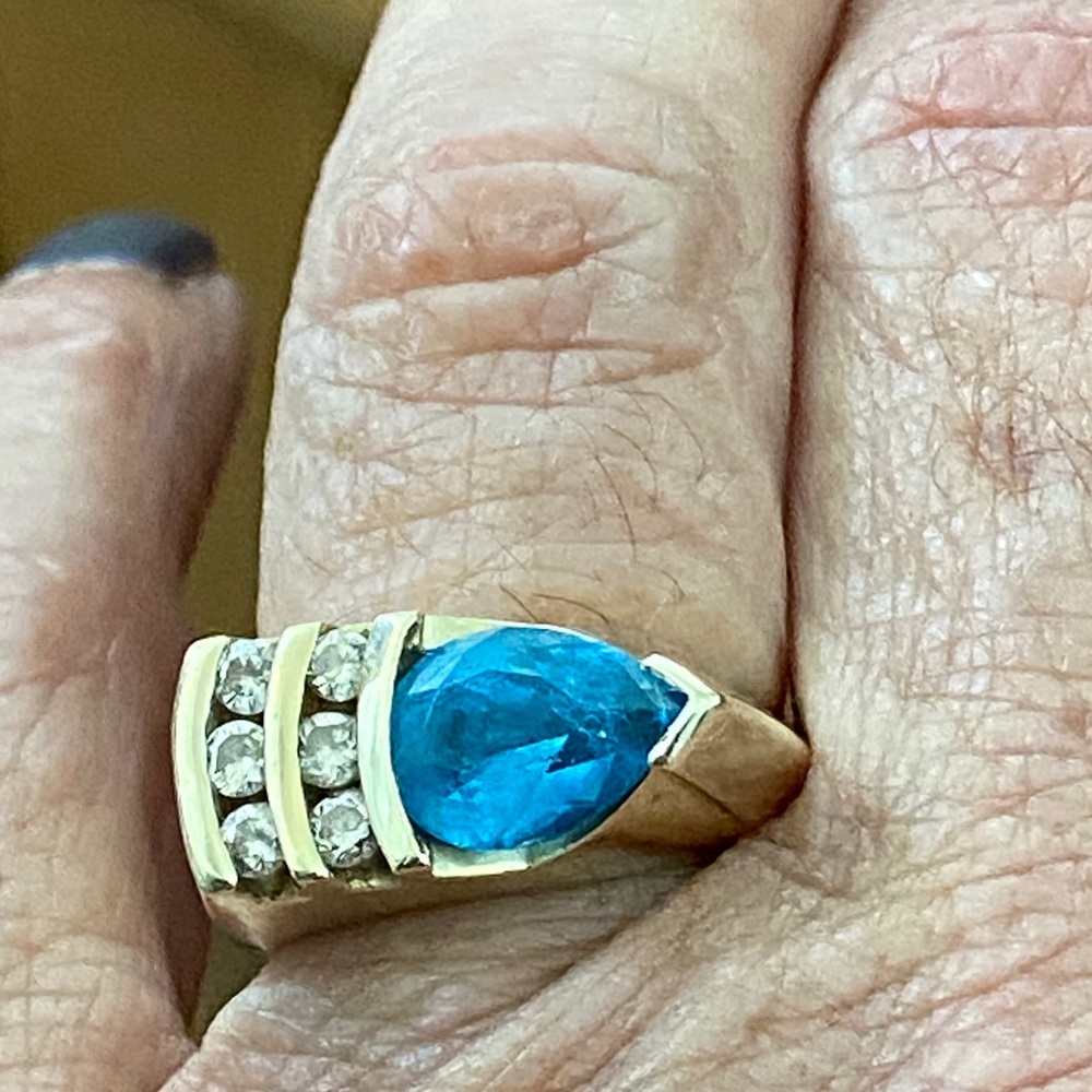 Size 7 blue Topaz and diamond 14 k solid yellow gold ring